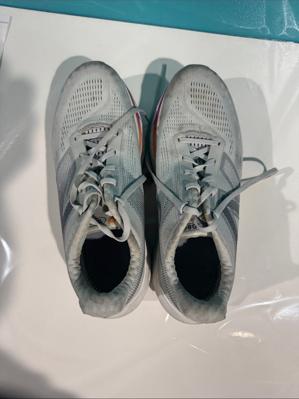 New Balance Women's Light Gray and Pink Accent Running Sneakers